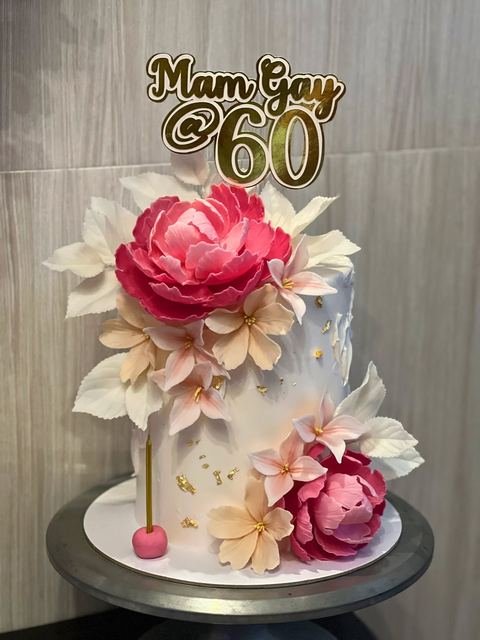 Birthday cake with a floral 60th theme