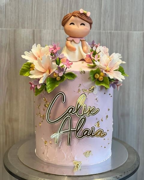 Birthday cake with a floral fairy dust and gold theme