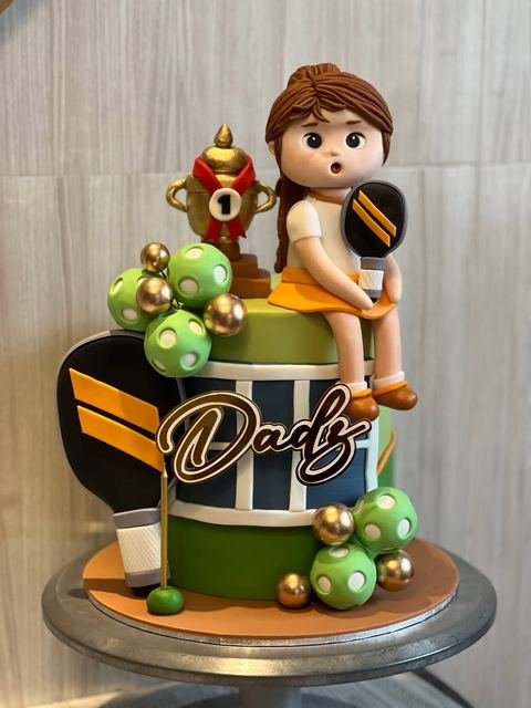 Birthday cake with a paddle board theme