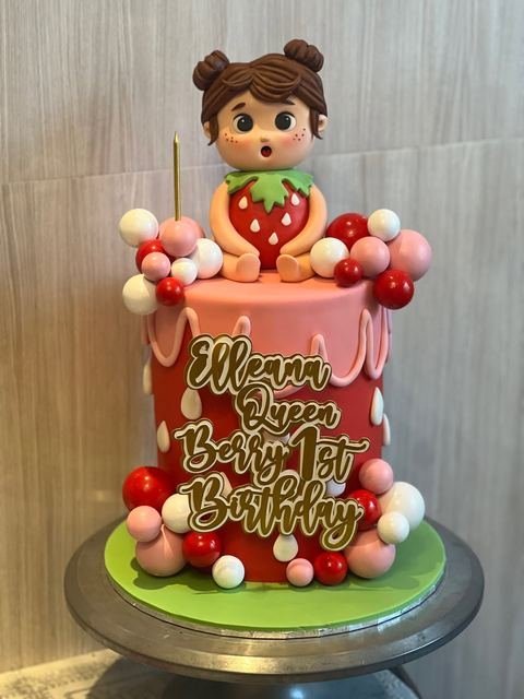Birthday cake with a strawberry baby theme