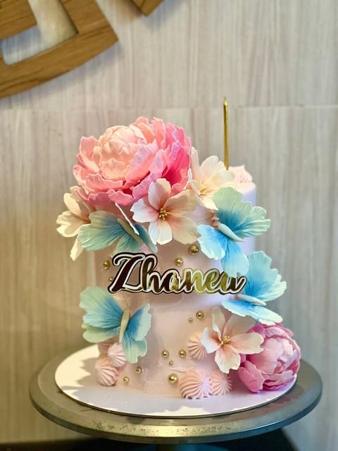 Birthday cake with a fantasy floral butterflies theme
