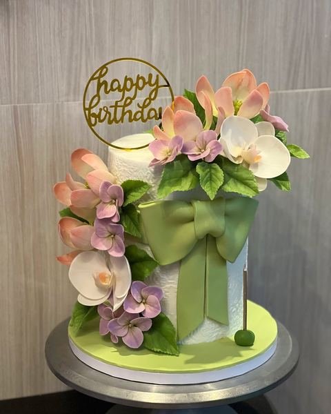 Birthday cake with a floral orchid theme