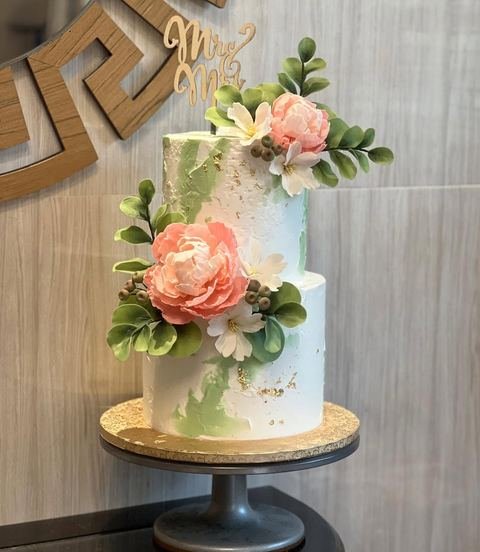 Birthday cake with a floral peonies pink and green gold theme