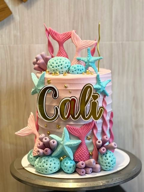 Birthday cake with an ocean coral mermaid theme