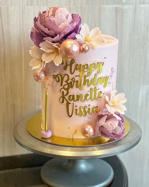Birthday cake with a violet peonies floral gold theme