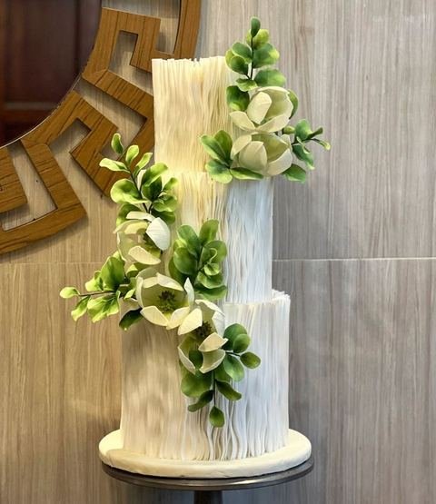 Three tier wedding cake with special detailing
