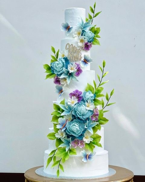Wedding cake, floral butterflies peonies lillies design