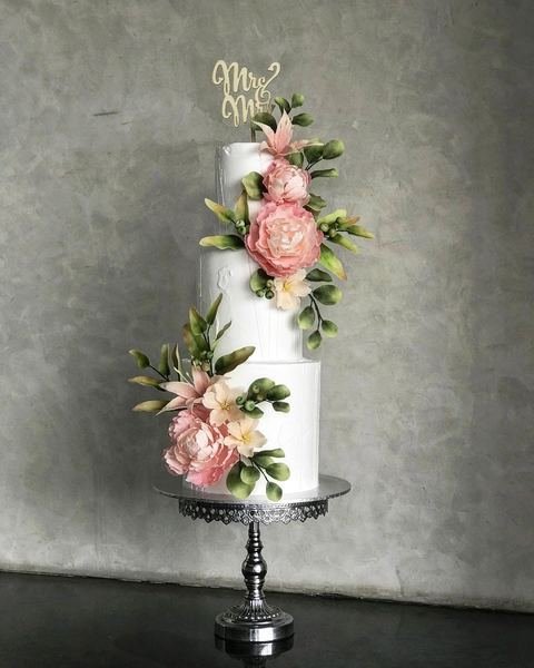 Wedding cake, green peonies pink floral design