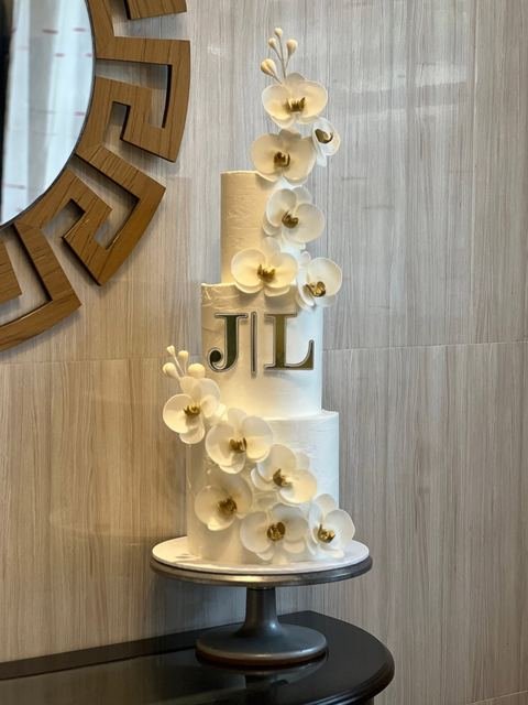 Wedding cake, simple orchid floral design