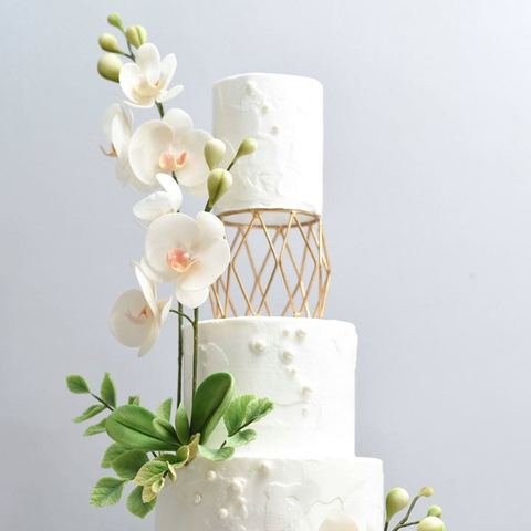 Wedding cake orchid tier detail